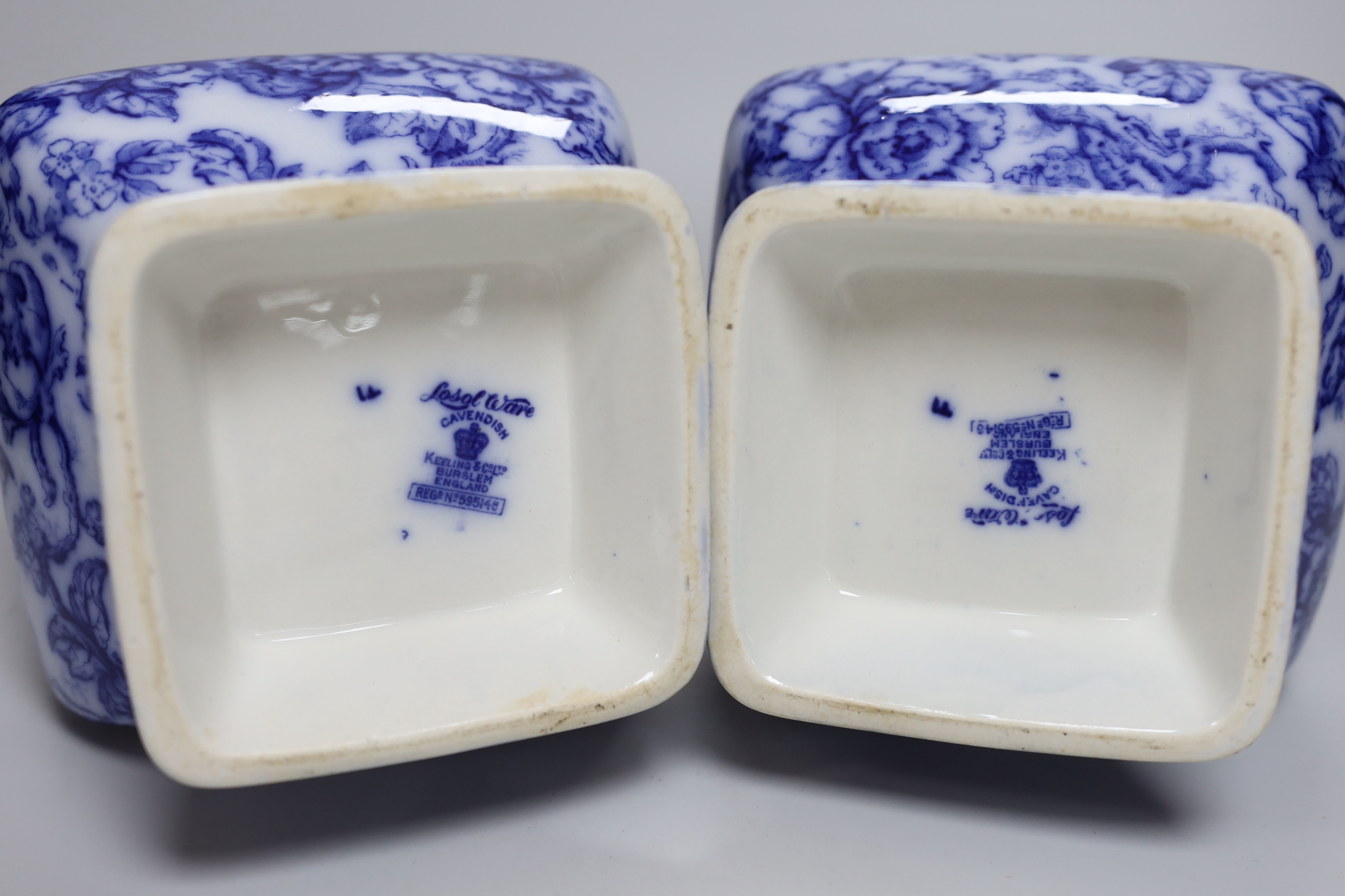 A pair of Losol ware blue and white vases, a slipware jug, a faience candle holder and a Chinese tea canister (without cover), vases 33cm high